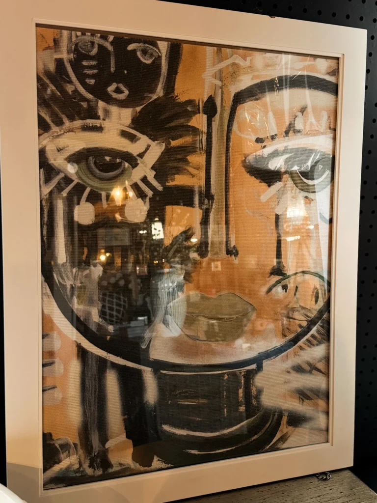 Framed eclectic art piece at Live Boho