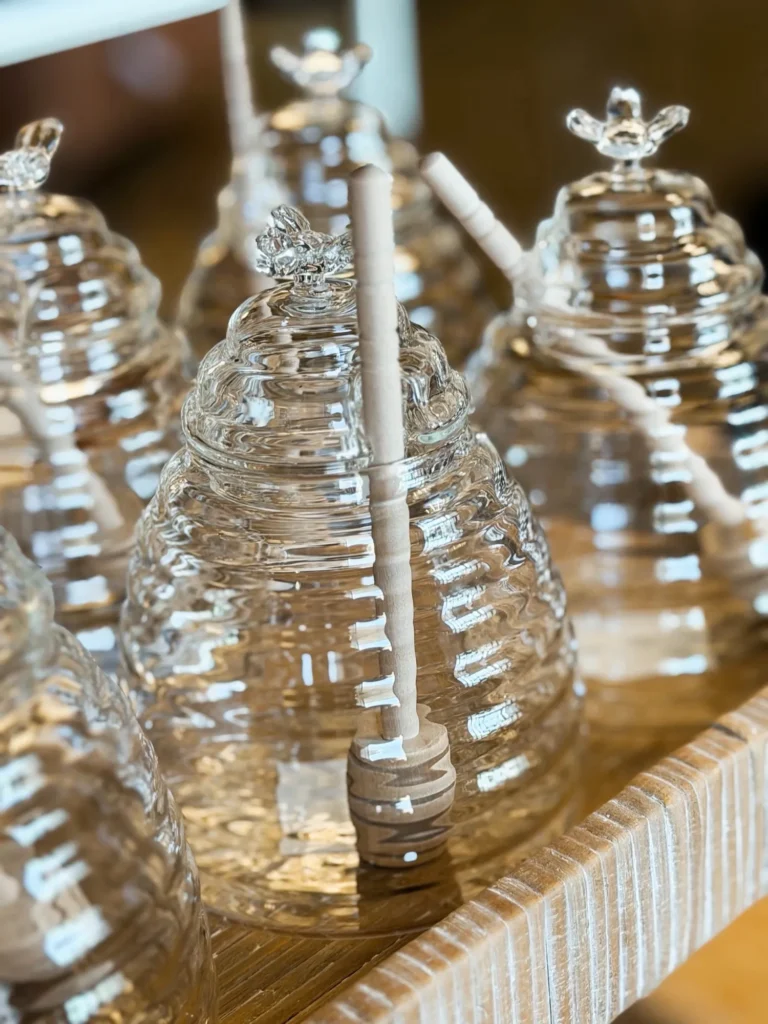 Glass honey jars with bee lids