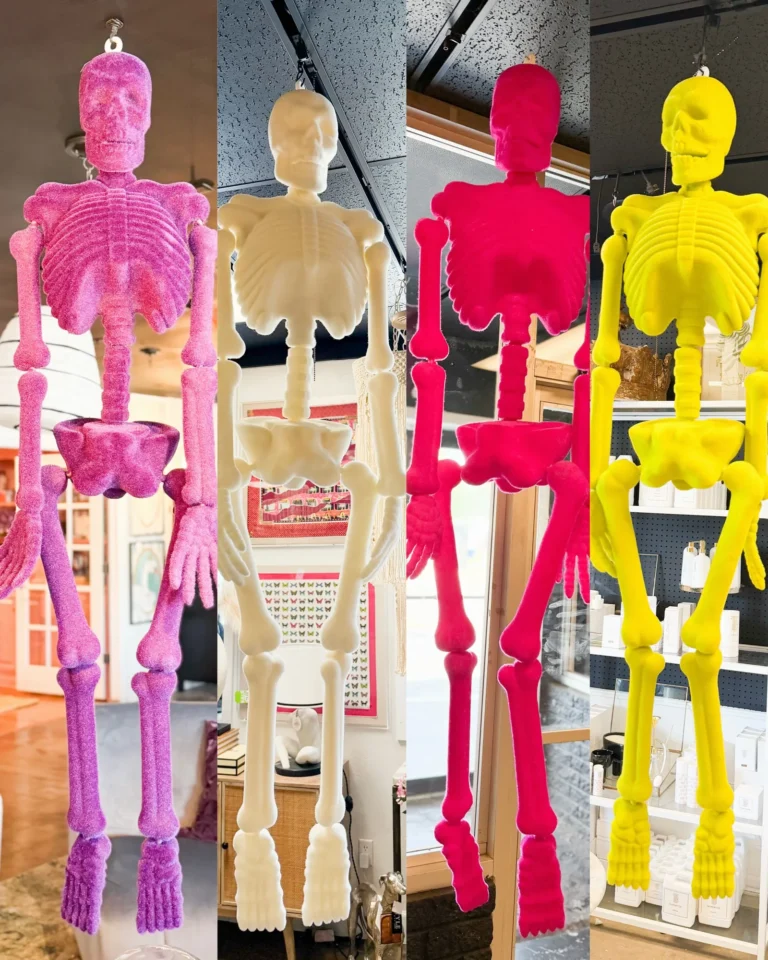 Neon pink, yellow and white skeleton Halloween decor at Live Boho