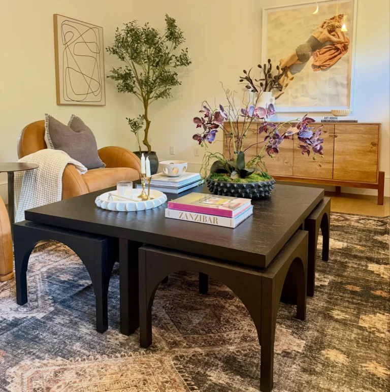 Staged coffee table with layered books and fresh greenery – home staging Oklahoma City by Live Boho